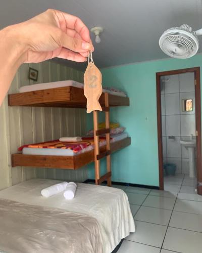 Katil atau katil-katil dalam bilik di Pousada Praia Mansa Superagui