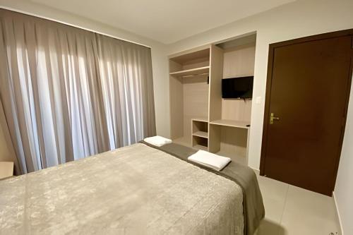 Postel nebo postele na pokoji v ubytování Edifício Shalfa