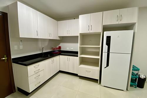 Kuchyň nebo kuchyňský kout v ubytování Edifício Shalfa