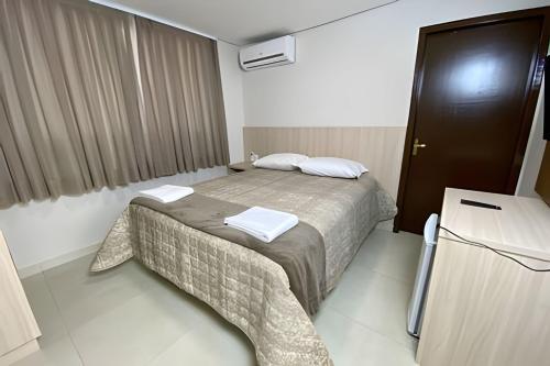 Postel nebo postele na pokoji v ubytování Edifício Shalfa