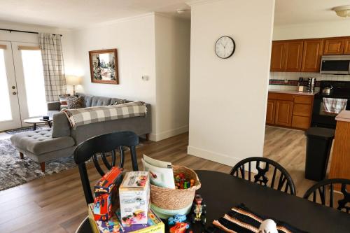 a kitchen and a living room with a table at Central Richland 3 bedroom in Richland