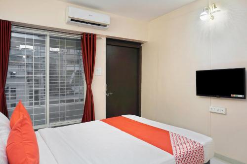 Μια τηλεόραση ή/και κέντρο ψυχαγωγίας στο Hotel O Sai Inn