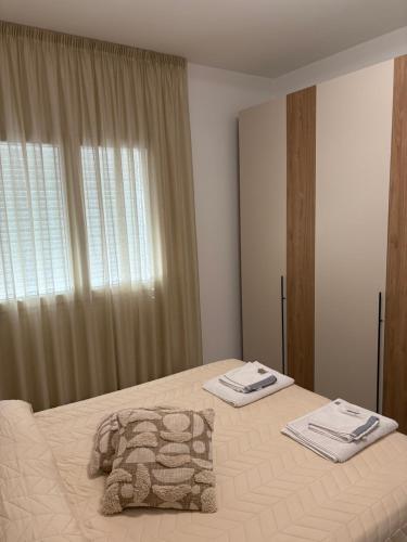 Postel nebo postele na pokoji v ubytování Boutique Valeria