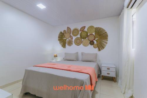 En eller flere senge i et værelse på Casa na Barra de Santo Antônio com piscina