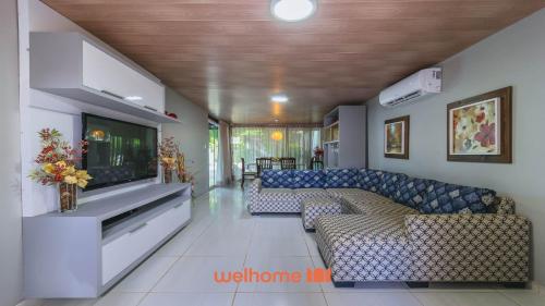 Et opholdsområde på Casa na Barra de Santo Antônio com piscina