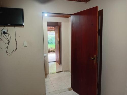 TV a/nebo společenská místnost v ubytování Coruja Suites - Ilha Grande