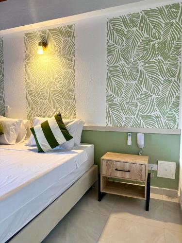 Ένα ή περισσότερα κρεβάτια σε δωμάτιο στο Ivanna Hotel Campestre - Santa Fe de Antioquia