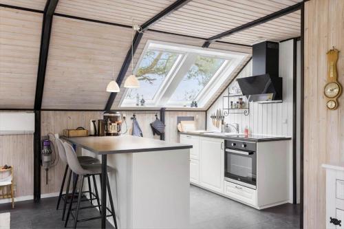 a kitchen with a counter and a window at LL248-Humble-Birkevaenget-9 in Humble
