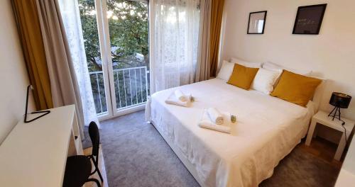 Katil atau katil-katil dalam bilik di White Door Zagreb self check-in apartment with free public parking