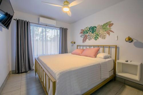 Una cama o camas en una habitación de Villa María - Perfect Getaway