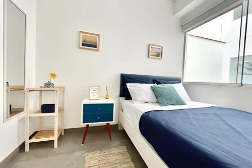 Кровать или кровати в номере Beach view apartment Punta Hermosa 4BR