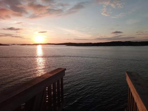 a sunset over a body of water at 6 person holiday home in Bovallstrand-By Traum in Bovallstrand