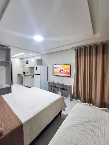 Ένα ή περισσότερα κρεβάτια σε δωμάτιο στο Studio 08 - 2K Atalaia Apenas150m da Orla