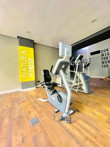 a gym with several exercise bikes in a room at Appartement Dahlia - Haut Standing - Mohammedia Natura Living in Mohammedia