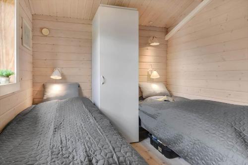 Ένα ή περισσότερα κρεβάτια σε δωμάτιο στο C11589-Hemmet-Bork-Hytteby-7