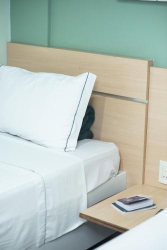 Postel nebo postele na pokoji v ubytování Hotel da Lea