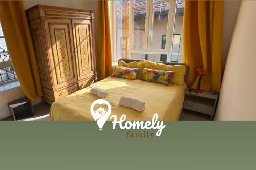 a bedroom with a bed with towels on it at Baroni B - FREE private parking-wi- fi and A-C in Milan