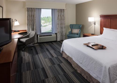 Ένα ή περισσότερα κρεβάτια σε δωμάτιο στο Hampton Inn & Suites Davenport