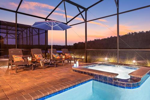 Πισίνα στο ή κοντά στο NEW 9Bdrm S. Facing Pool on Preserve near Dis/Univ