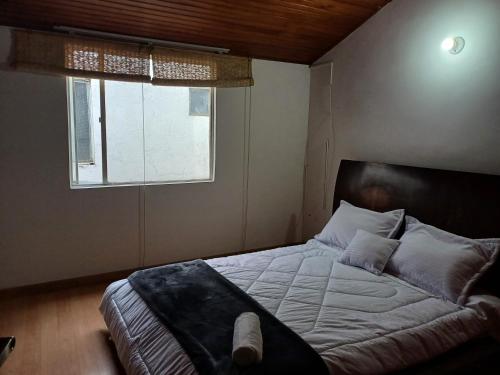 Postel nebo postele na pokoji v ubytování Casa Amplia y cómoda en zona tranquila de la ciudad