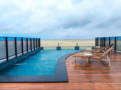 Πισίνα στο ή κοντά στο Flats térreo pé na areia no Alta Marine