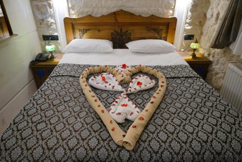 Katil atau katil-katil dalam bilik di Mirzade Konak Hotel