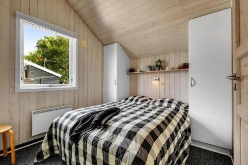 En eller flere senge i et værelse på C11101-Hemmet-Bork-Hytteby-53