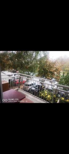 a view of a parking lot with parked cars at Apartman Dunja in Belgrade