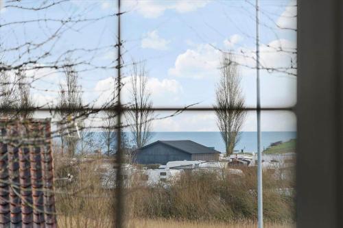 a view from a window of a field with houses at SJ243-Haderslev-Vikaerparken-79 in Haderslev