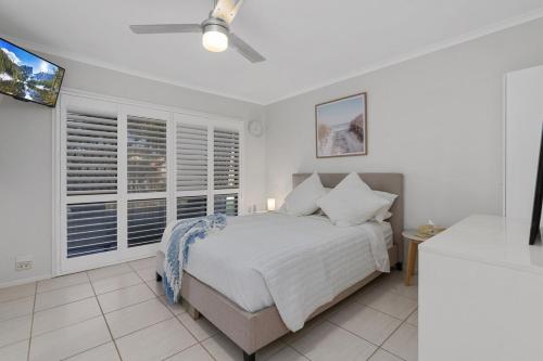 Una cama o camas en una habitación de Pandanus Retreat