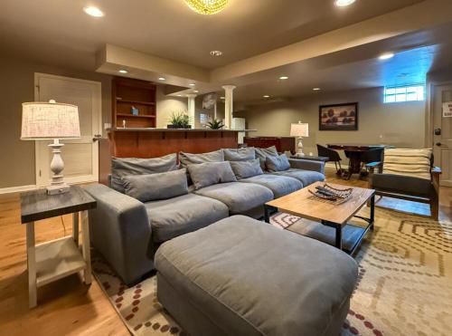 a living room with a couch and a table at Dream Retreat Indiana Dunes National Park in Tolleston