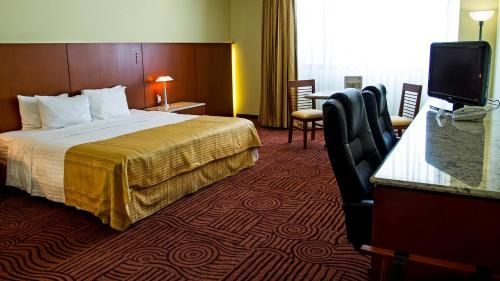 Letto o letti in una camera di Holiday Inn Puebla Finsa by IHG