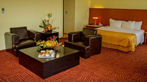 Letto o letti in una camera di Holiday Inn Puebla Finsa by IHG