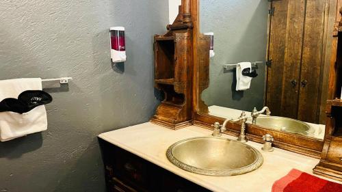 a bathroom with a sink and a mirror at Tizapan 05 NEW 1BE&1BA in Mexico City