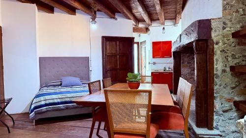a bedroom with a table and a bed in a room at Tizapan 01 NEW 1BE&1BA in Mexico City