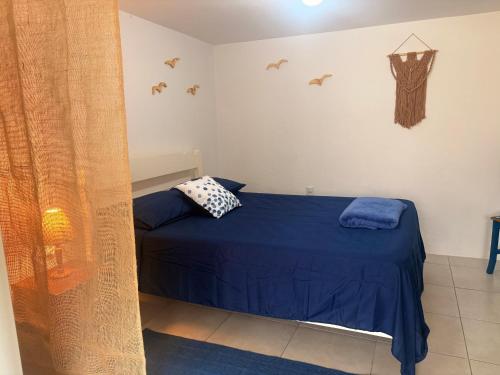 Postel nebo postele na pokoji v ubytování Quitinete para Casal em Garopaba