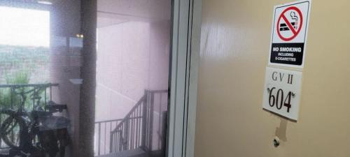 a no smoking sign on the door of a building at Great Family Condo with EZ Beach Access & SpaceX view Gulfview II #604 in South Padre Island