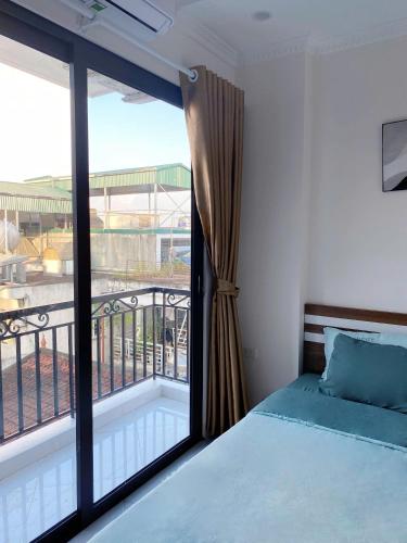 Ένα ή περισσότερα κρεβάτια σε δωμάτιο στο Hera West Lake Apartment
