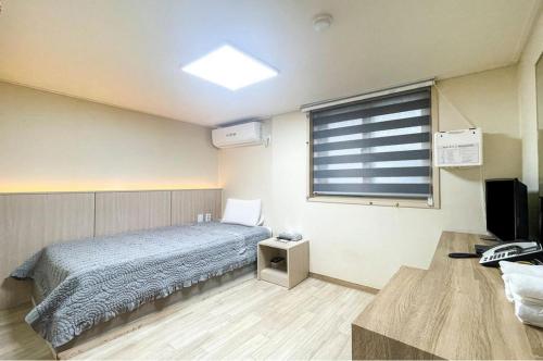 Katil atau katil-katil dalam bilik di Motel MJ
