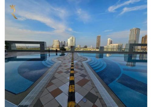 a rendering of a swimming pool in a city at Stylish Hydra Studio -Serene City Escape in Abu Dhabi