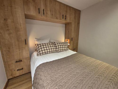 Postel nebo postele na pokoji v ubytování Tignes 2 pièces, 4 pers, WIFI, près des pistes - FR-1-502-601