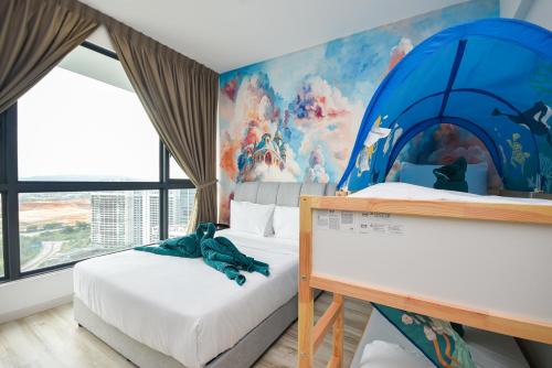 a bedroom with two beds and a mural at Macrolink Medini Theme Suite by Nest Home - Near Legoland in Iskandar Puteri