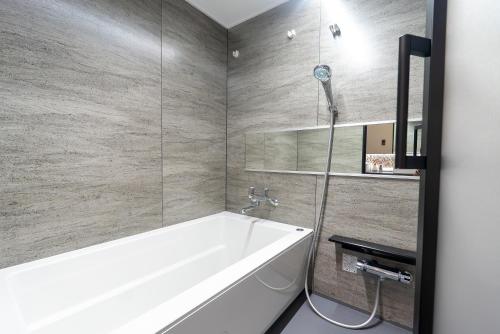 Koupelna v ubytování huu hotel