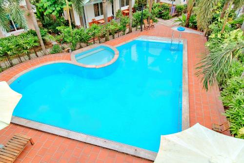 an overhead view of a large blue swimming pool at S79 Blue in Phu Quoc