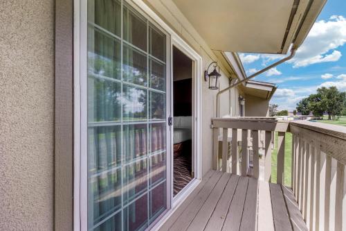 a balcony with a sliding glass door on a house at Quality Inn Umatilla - Hermiston in Umatilla