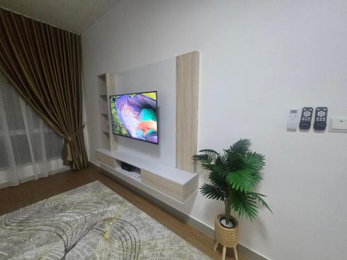Μια τηλεόραση ή/και κέντρο ψυχαγωγίας στο Nine9 Homestay