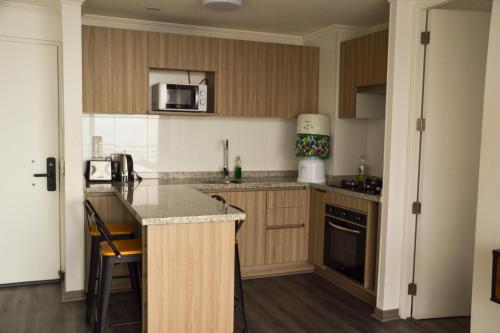 Moderno departamento con vista única - Iquiqueにあるキッチンまたは簡易キッチン