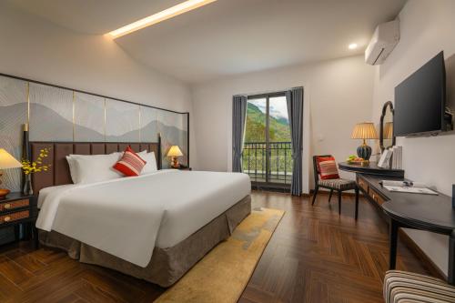 TV a/nebo společenská místnost v ubytování DeLaMont Sapa Hotel - Hill Serenity Retreat