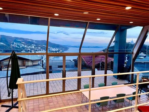 a view from the balcony of a cruise ship at Private Fireworks View & Hot spring Villa Atami in Atami