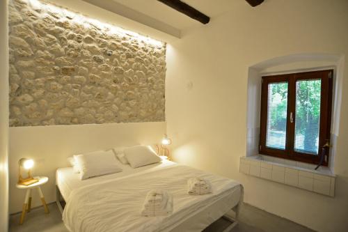 Postel nebo postele na pokoji v ubytování House 561